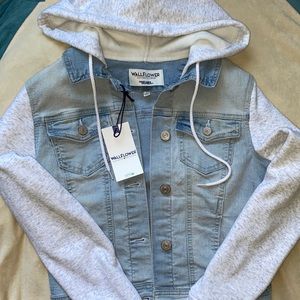 Brand new Wallflower Denim Jacket. Size small. Soft grey sleeves and hoodie.